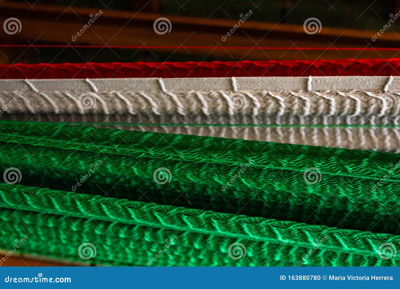 closeup on handmade hammock with mexican flag colors