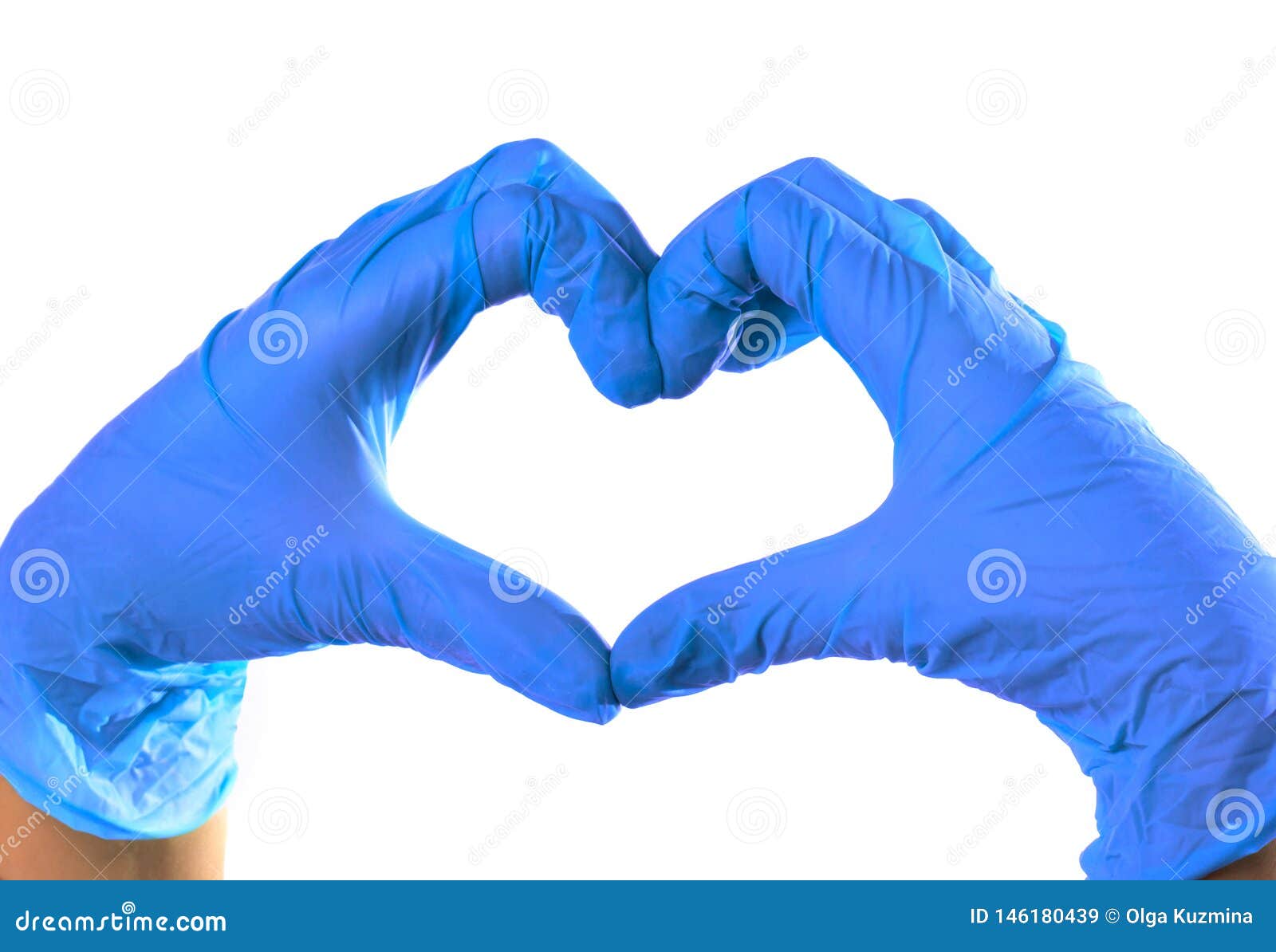 Closeup of Hands in Green Latex Gloves. the Heart is Folded from the ...