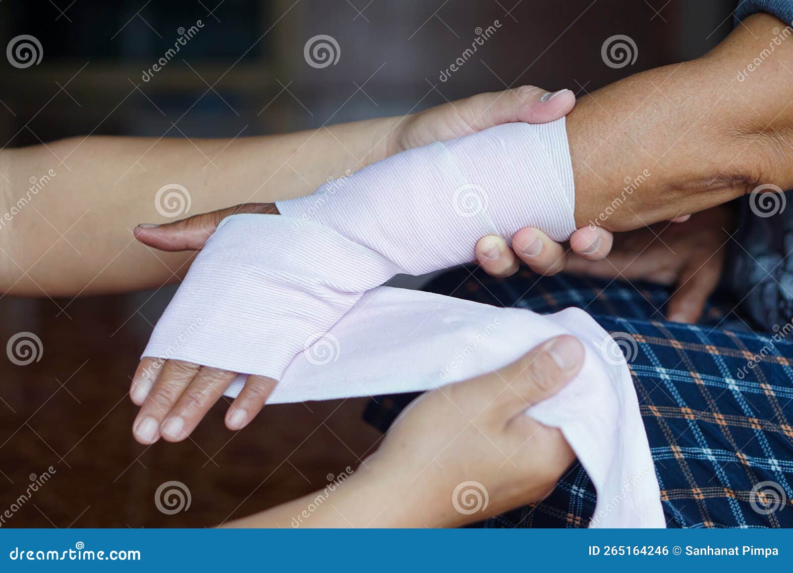 Closeup Hands Wrapping Patient S Sprained Wrist with Elastic Bandage. Stock Photo Image of