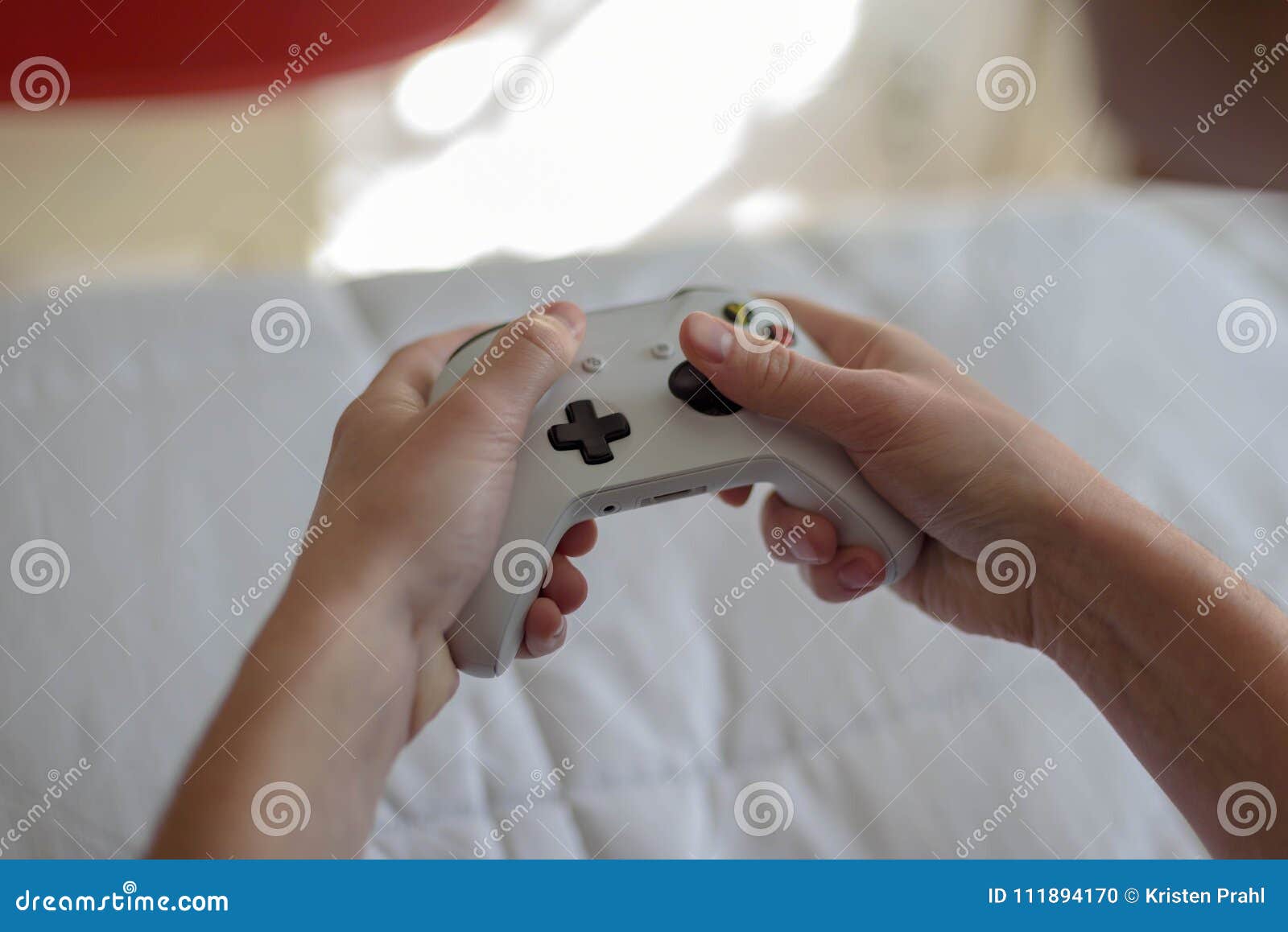 Premium Photo  Close up of gamer holding controller to play video games in  front of computer. player using joystick and playing online games on  monitor, sitting at desk. man gaming with