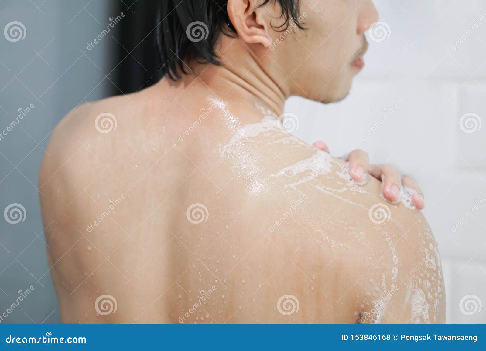 Closeup Handsome Asian Man Taking A Shower In The Bathroom