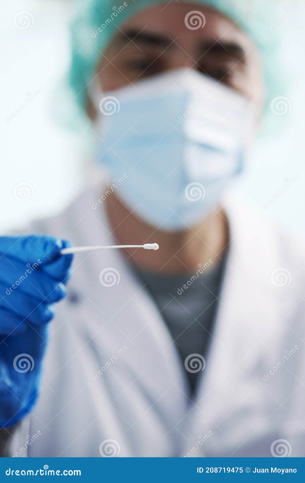 worker about to take a nasopharyngeal culture