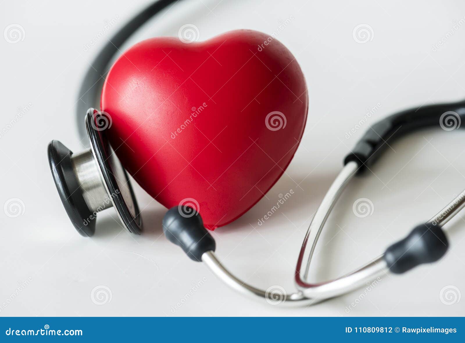 closeup of heart and a stethoscope cardiovascular checkup concept