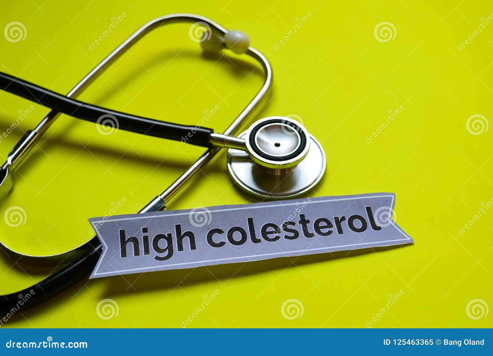 closeup high colesterol with stethoscope concept inspiration on yellow background