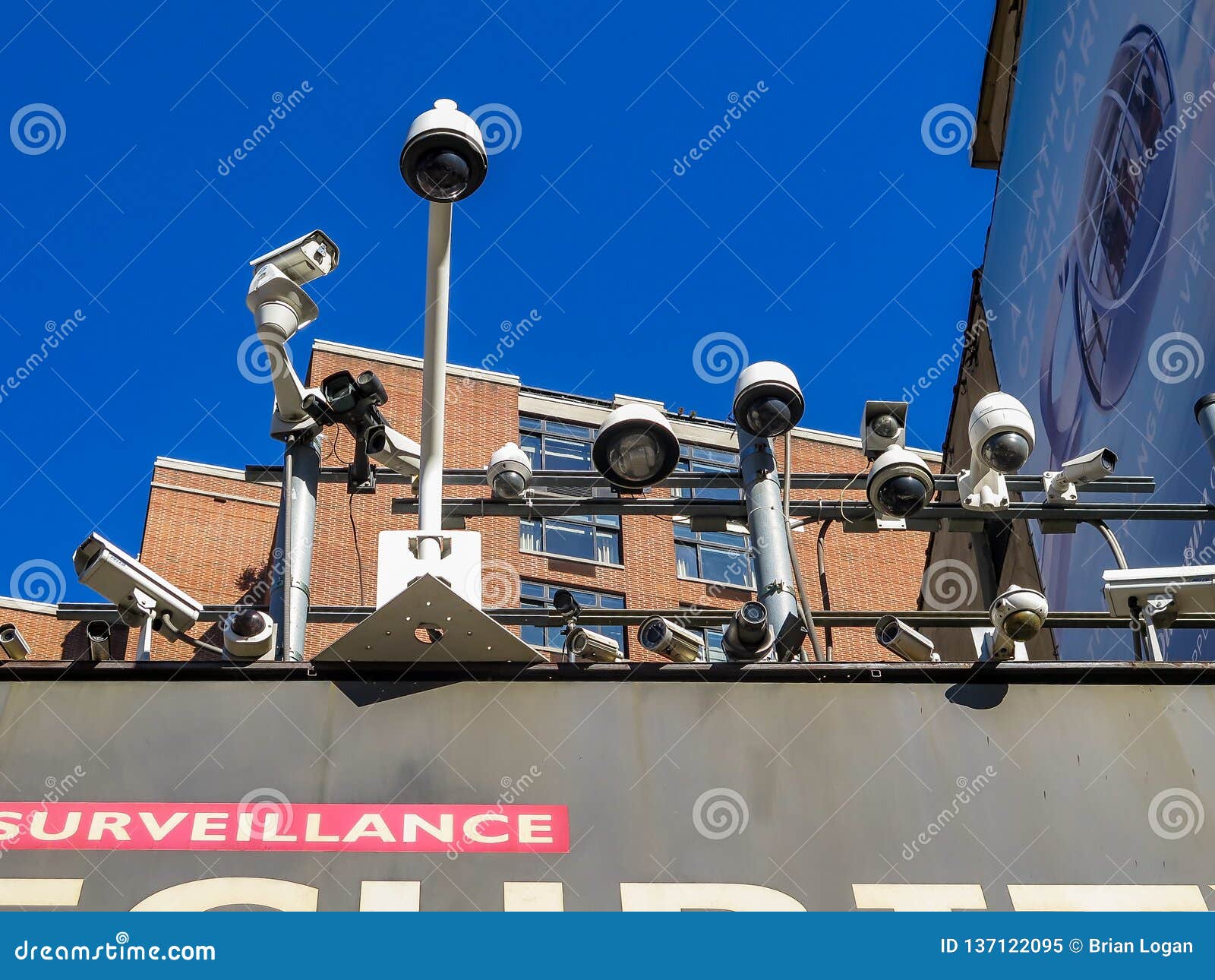 An Array of Surveillance Cameras on Top of a Shop in Manhattan Stock