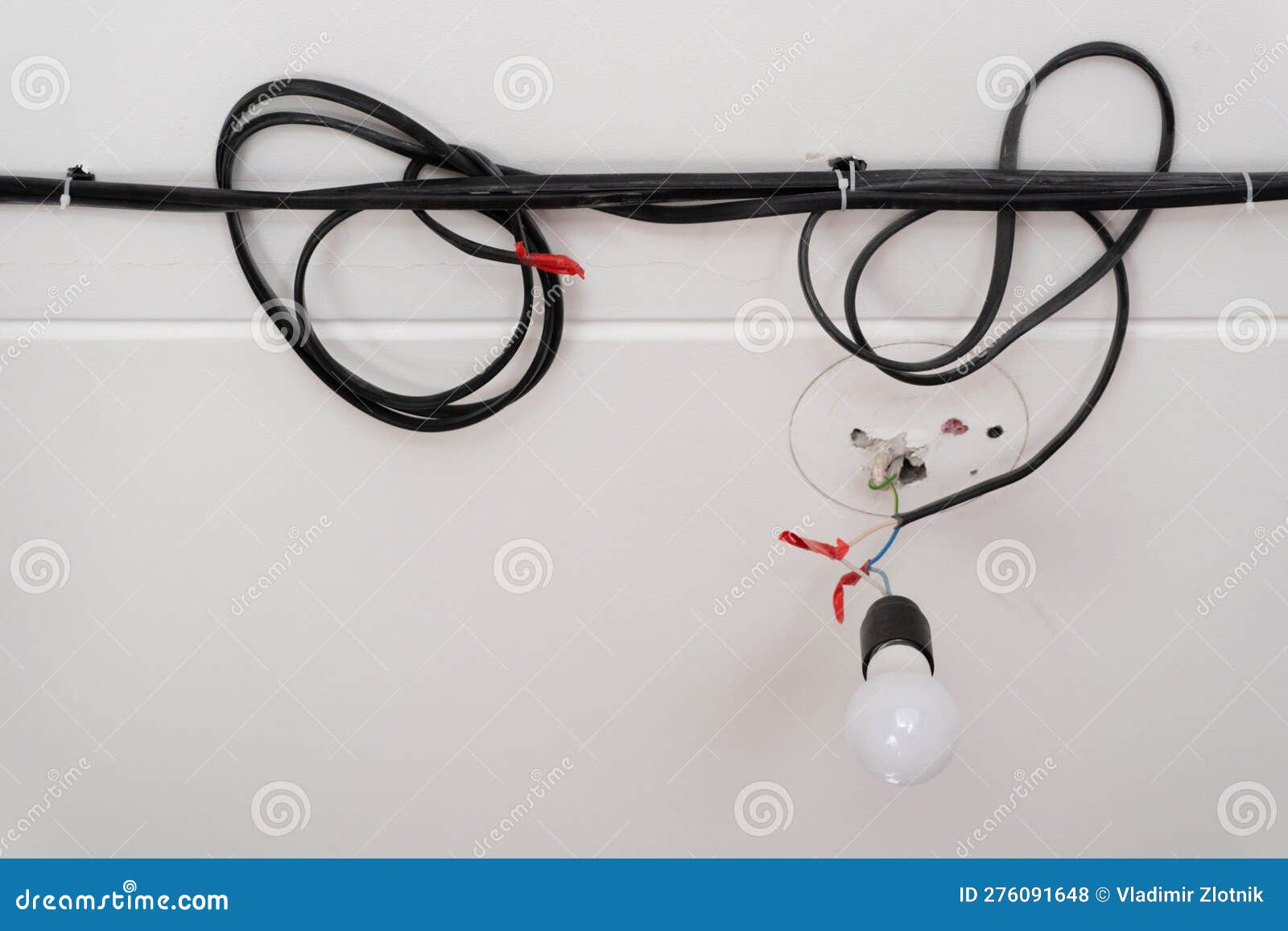 Closeup of Light Bulb Hanging on the Electric Wires Stock Photo Image