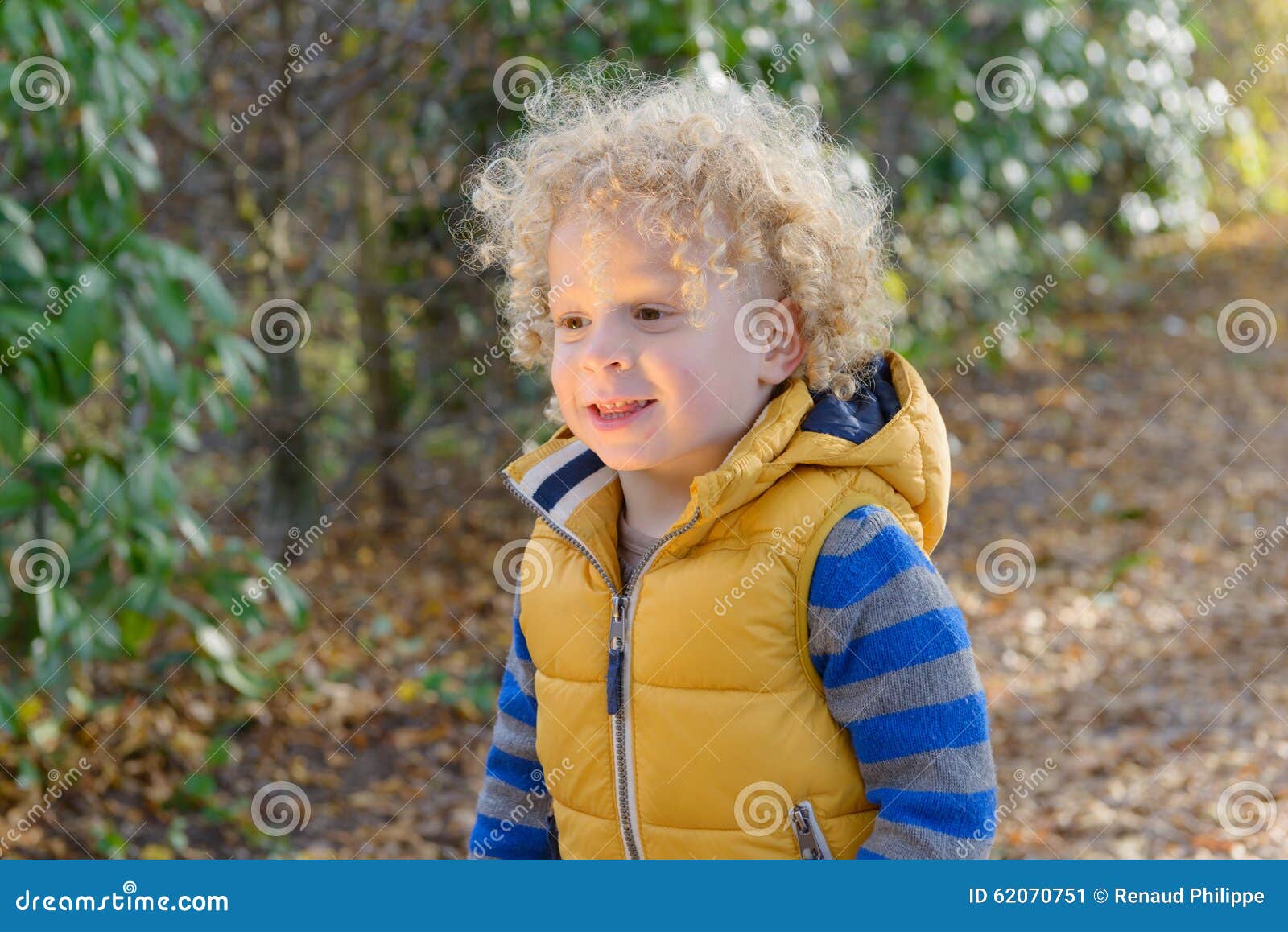 Closeup Of Little Cute Boy With Blonde Curly Hair Stock Image