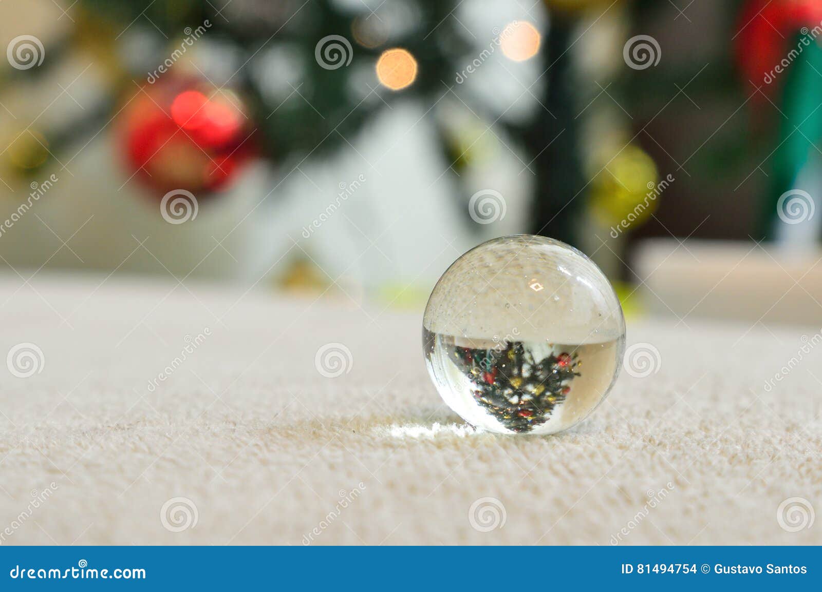 Download Closeup A Little Glass Ball Reflecting An Inverted Christmas Tree Stock Image