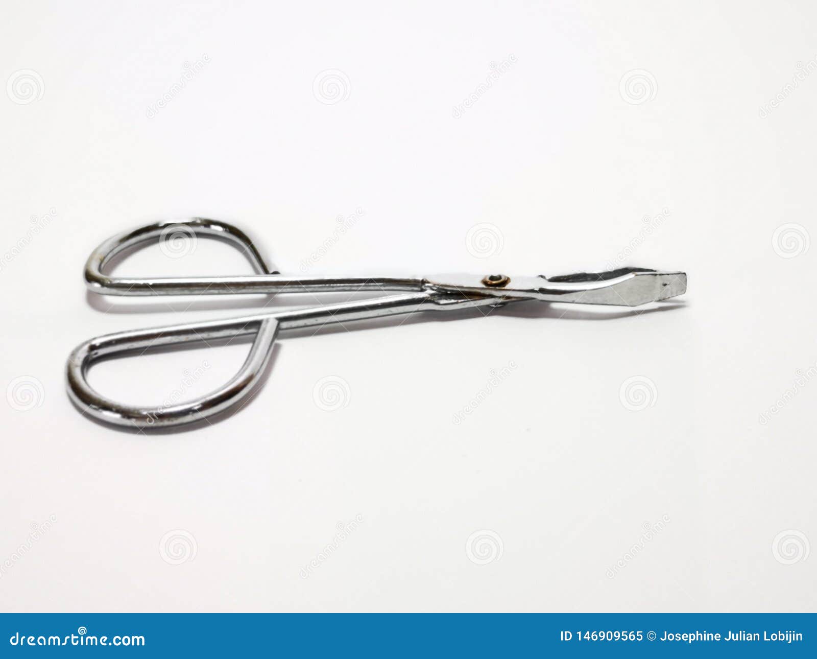 Closeup And A Macro Shot Of Skin Removal Pull Hair Tool With White