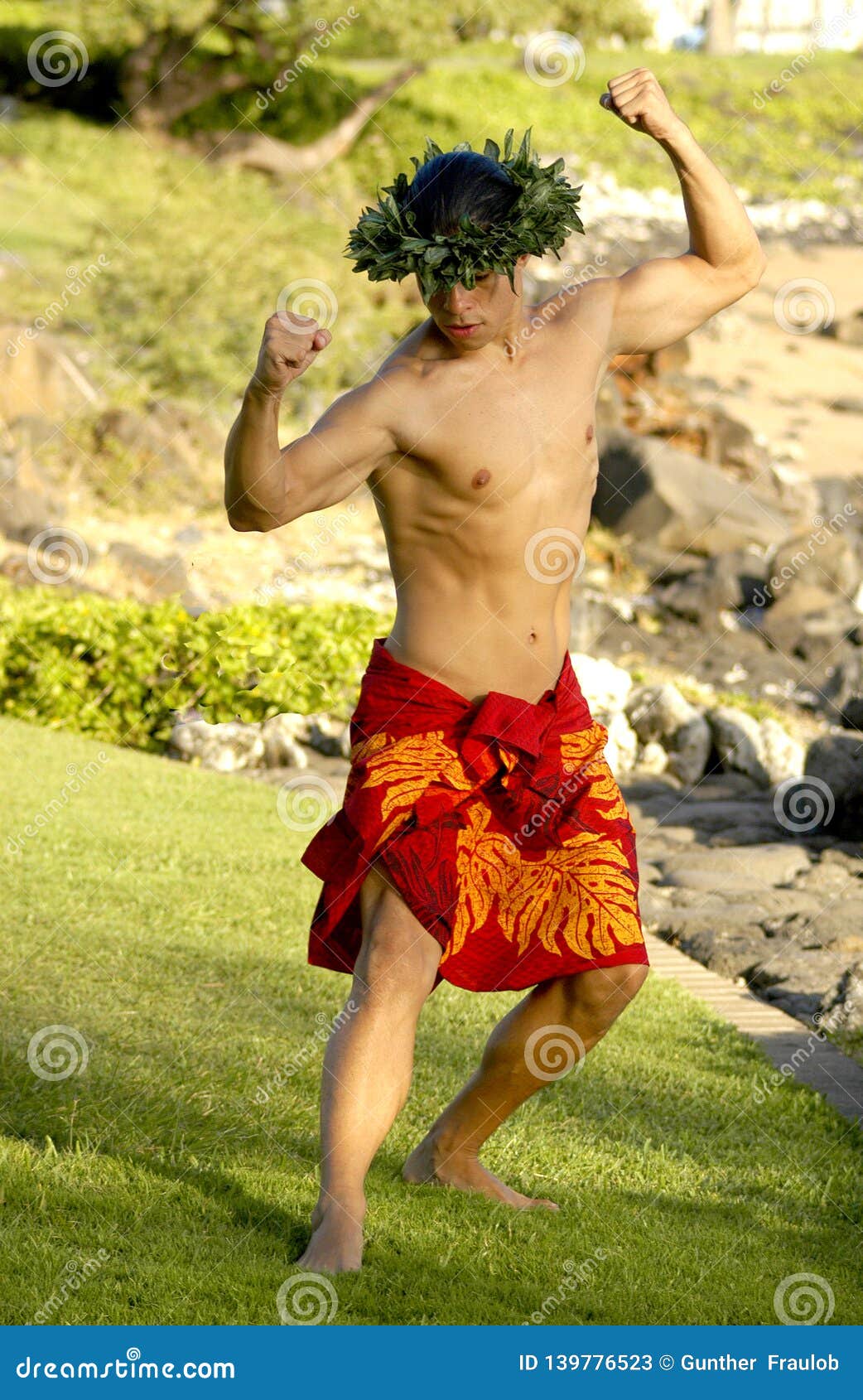 A Closeup of a Male Hawaiian Hula Dancer in a Very Masculine Pose ...
