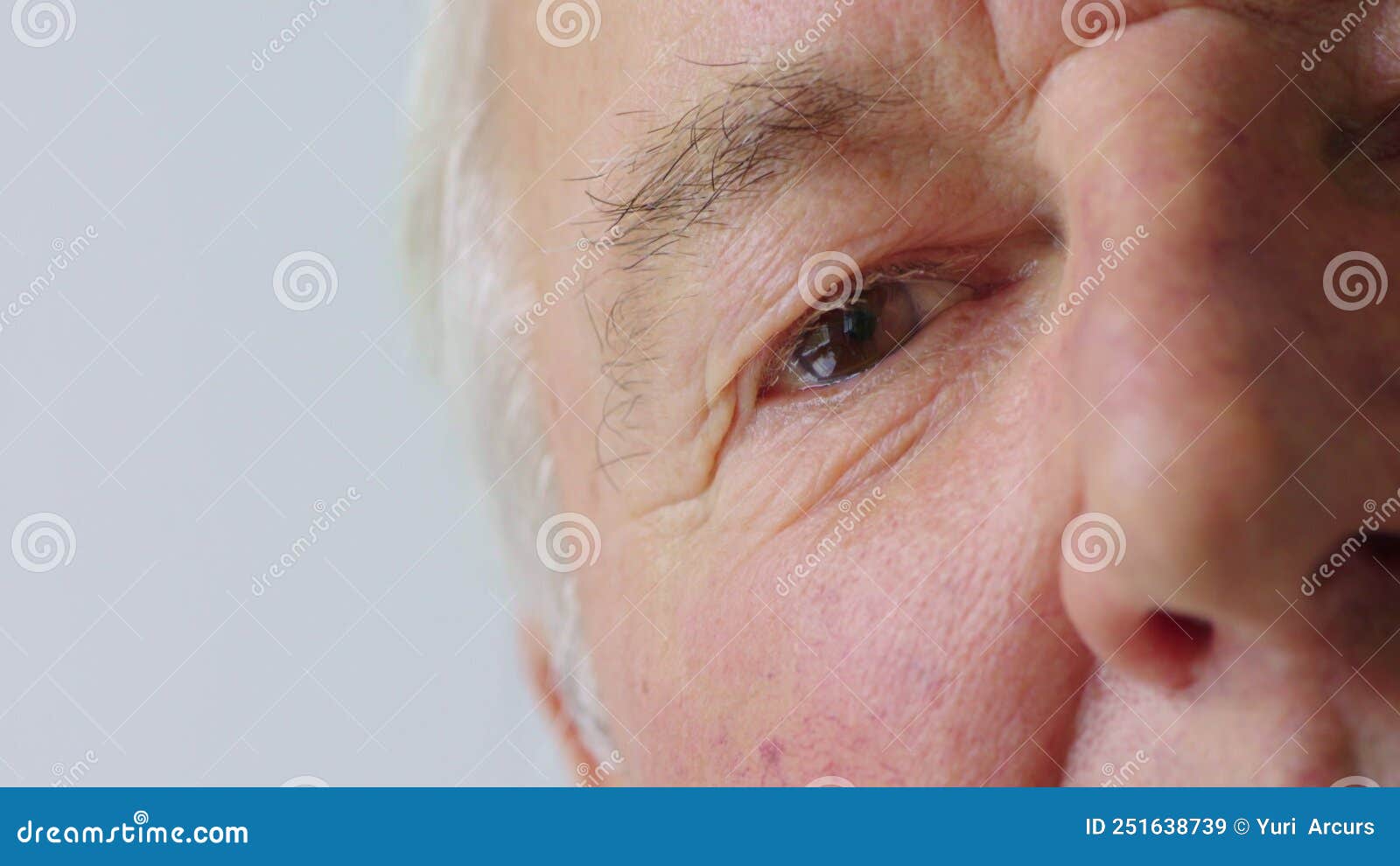 Closeup of a Man Testing His Vision and Eyesight at the Optometrist