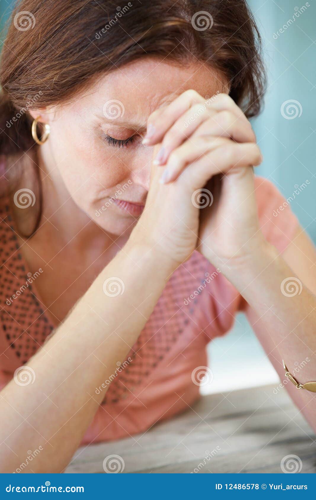 Closeup Of A Mature Woman Praying To God With Hope Stock Photo - Image