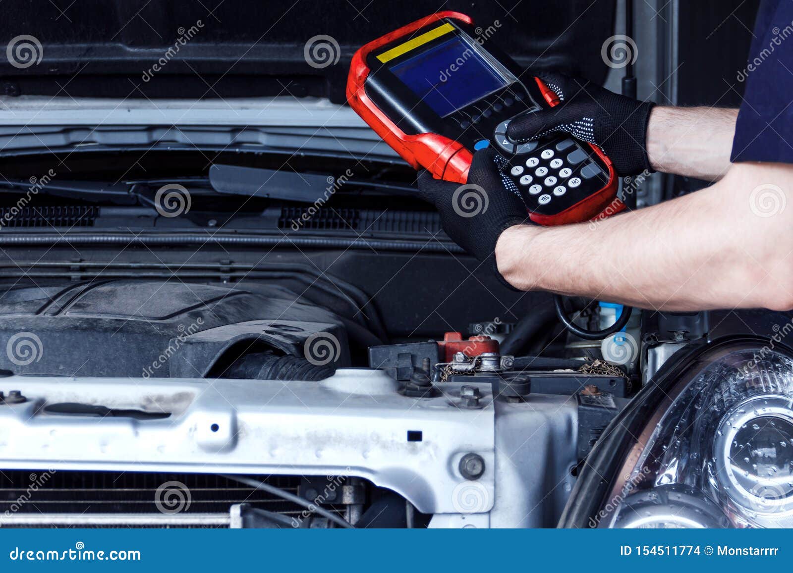 mechanic engineer repair car at car service station