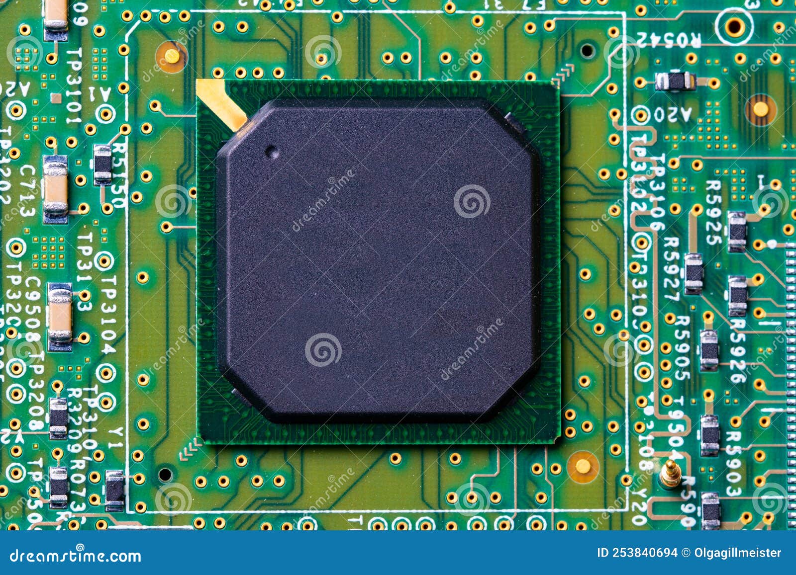 Closeup of Micro Processor Chip on Motherboard in Computer. Green