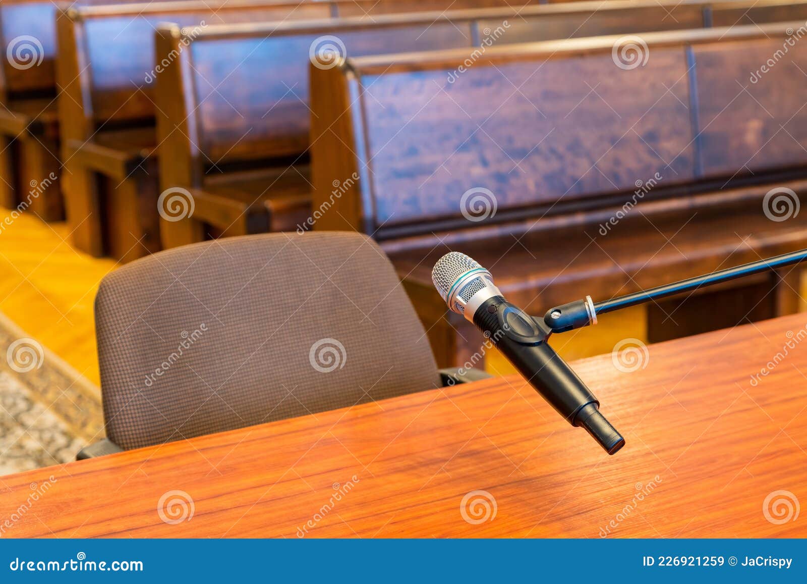 closeup of microphone in the courthouse. justice system, witness testimony. nobody