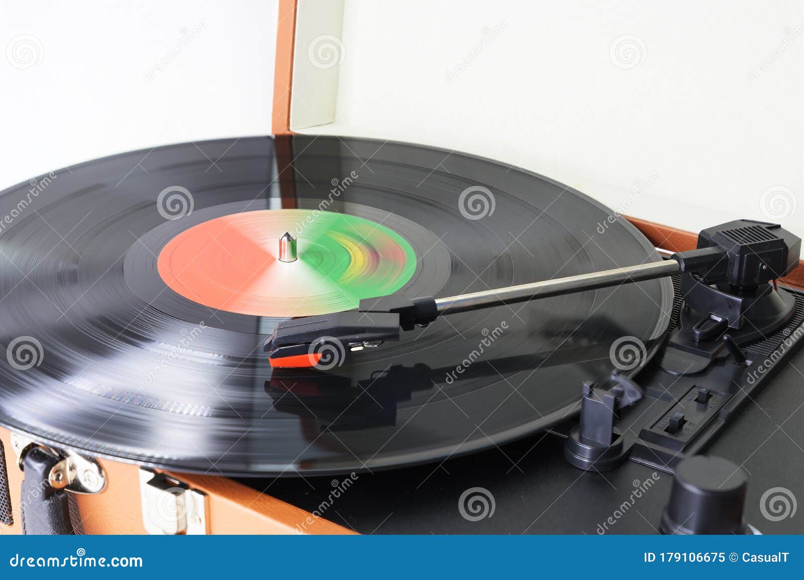 Closeup Of An Old Fashioned Suitcase Record Player And Turntable With A Spinning Vinyl Record Isolated On White Stock Image Image Of Analog Closeup