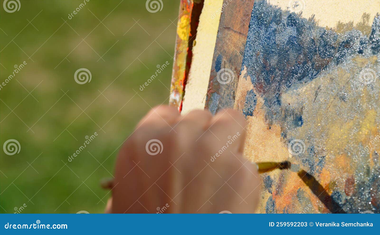 Unknown Painter Drawing Nature Outdoor. Closeup Artist Hand Creating