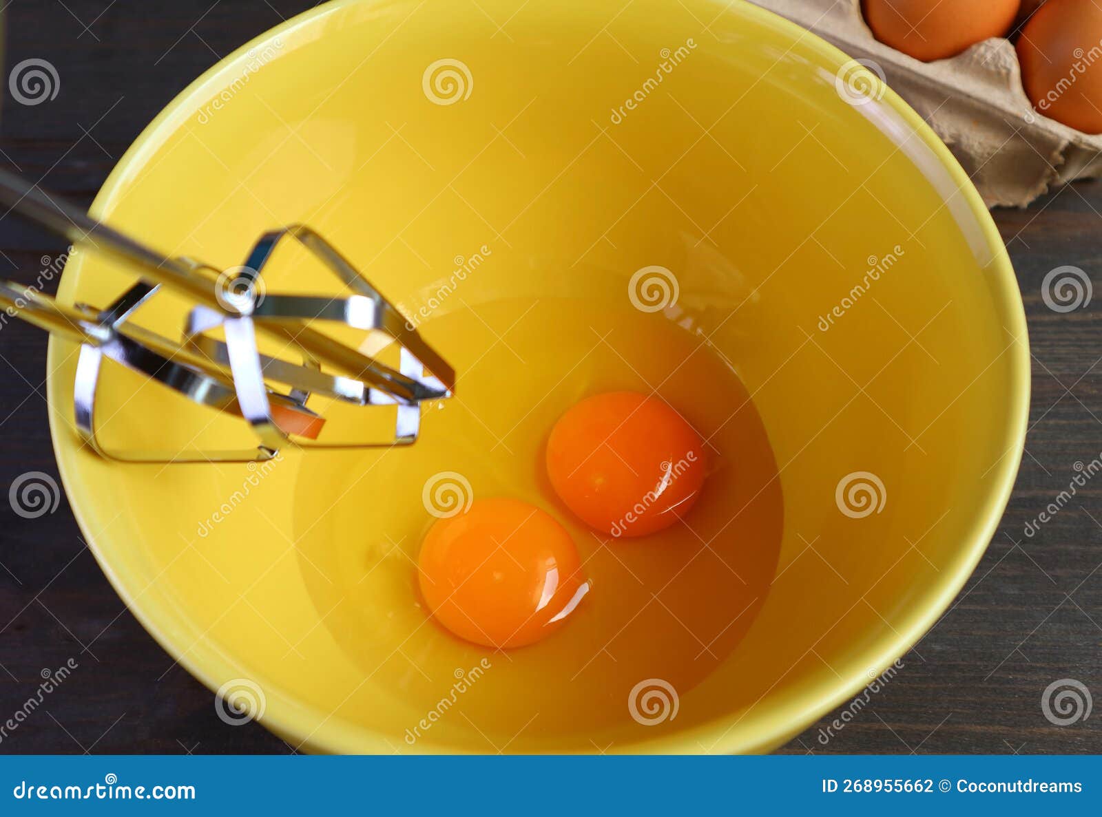 Pair of Raw Eggs in Mixing Bowl Going To Be Beaten Stock Photo Image