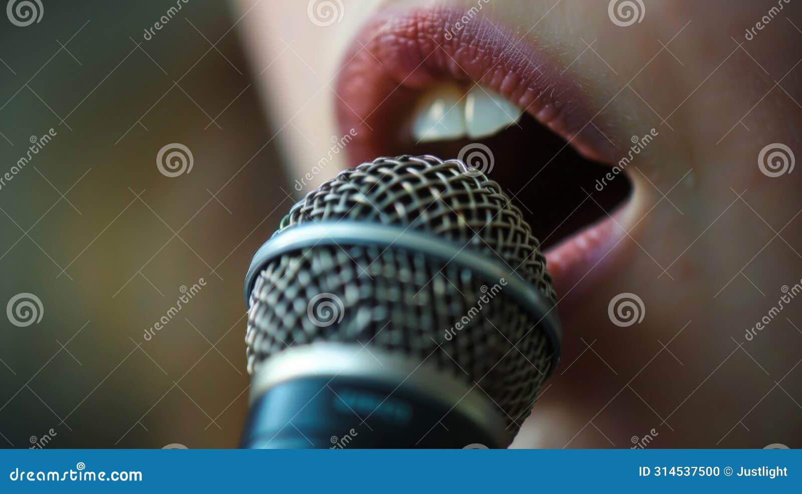 a closeup of a persons mouth with a microphone sped to face. as they speak and make different mouth movements the