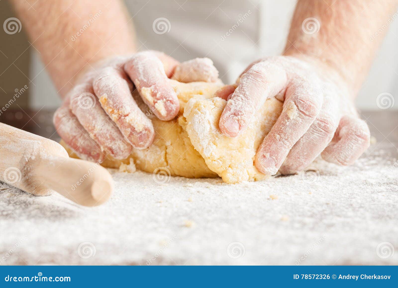 Closeup Photo of Baker Making Yeast Dough for Bread. Stock Photo