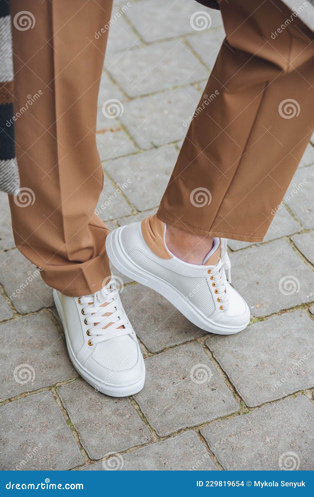 Closeup Photo of Beautiful Fashionable Woman Wearing Checkered Long Coat Beige  Pants White Blouse and Sneakers Stock Photo  Image of coat female  229819654