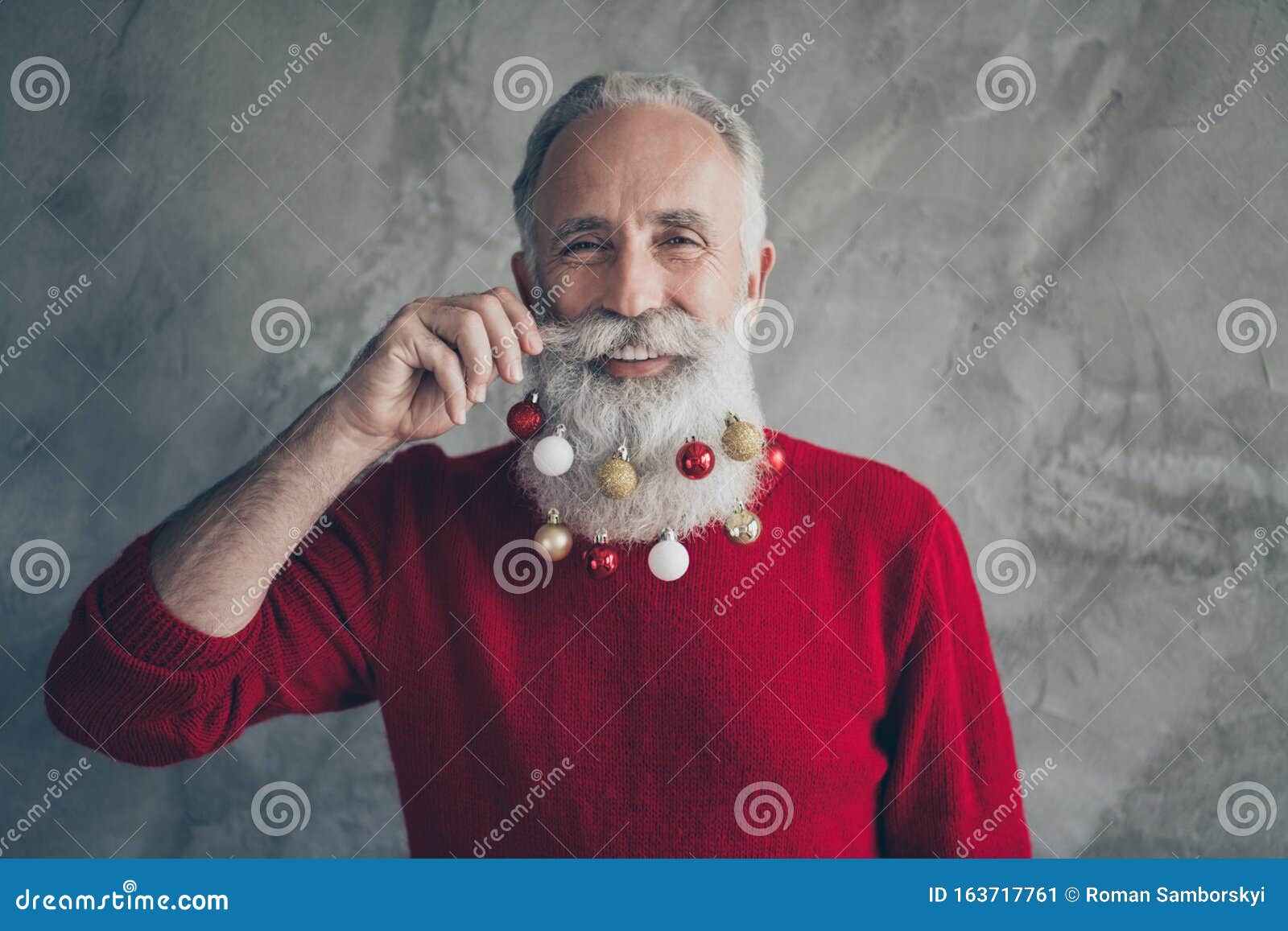 closeup photo of funny old santa claus man colorful toy balls in long beard x-mas decorations after salon wear red