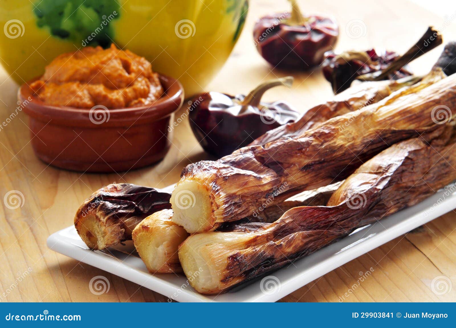 barbecued calcots, catalan sweet onions, and romesco sauce