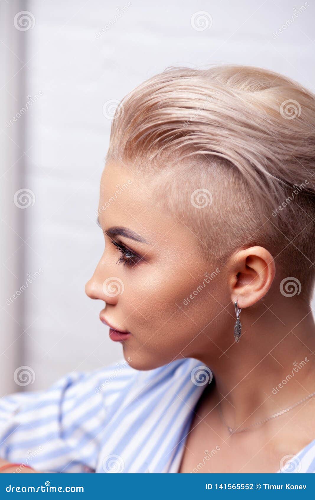 Beauty Girl Portrait With Makeup And White Short Hair Showing Earring  Jewelry Accessories Stock Photo Picture and Royalty Free Image Image  22578784