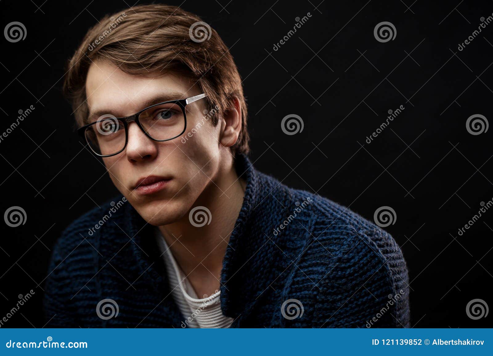 Closeup Portrait of Handsome Guy in Blue Knitted Sweater Stock Photo ...