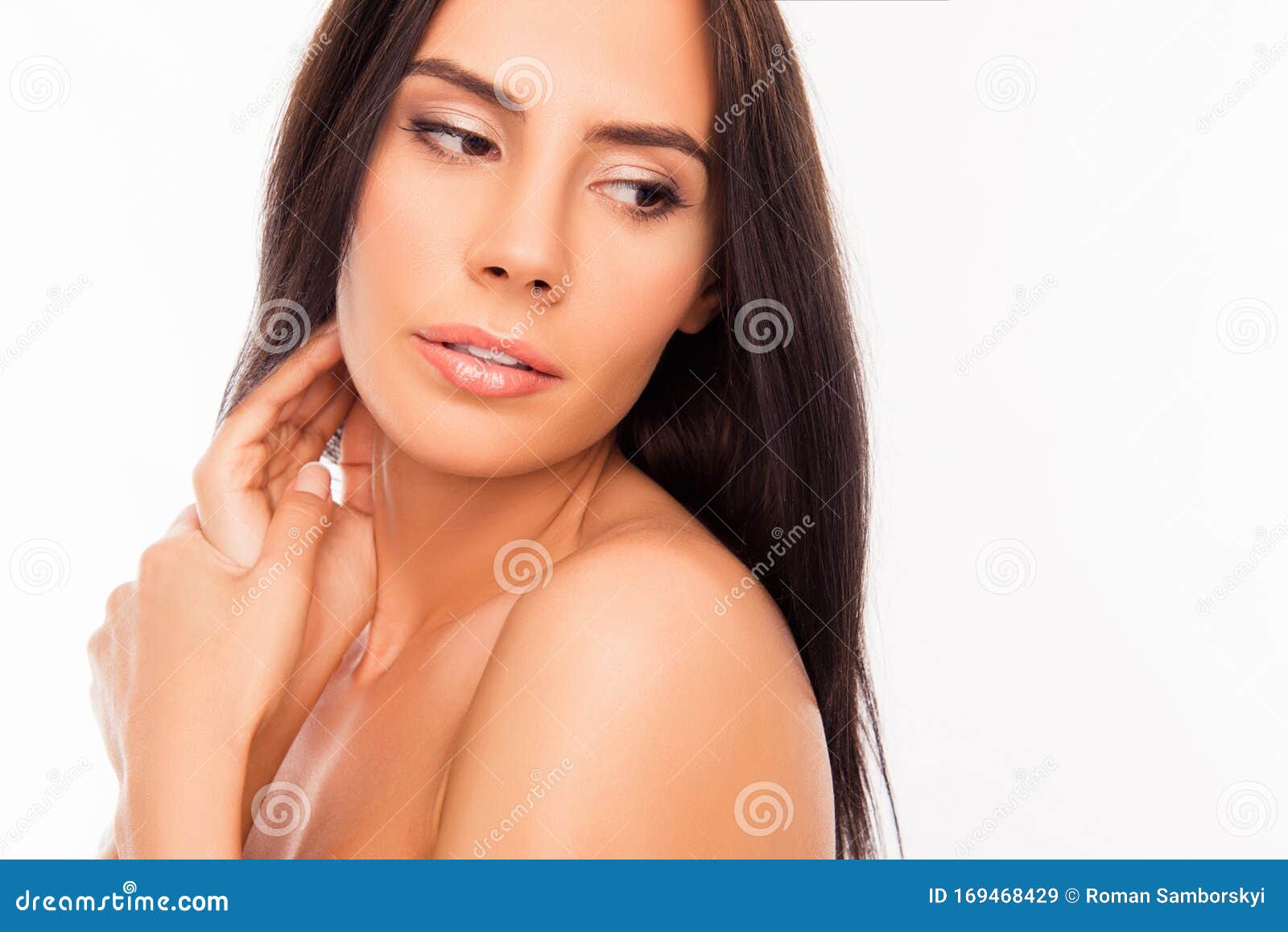 Closeup Portrait Of Tender Attractive Young Woman Touching Her Face 