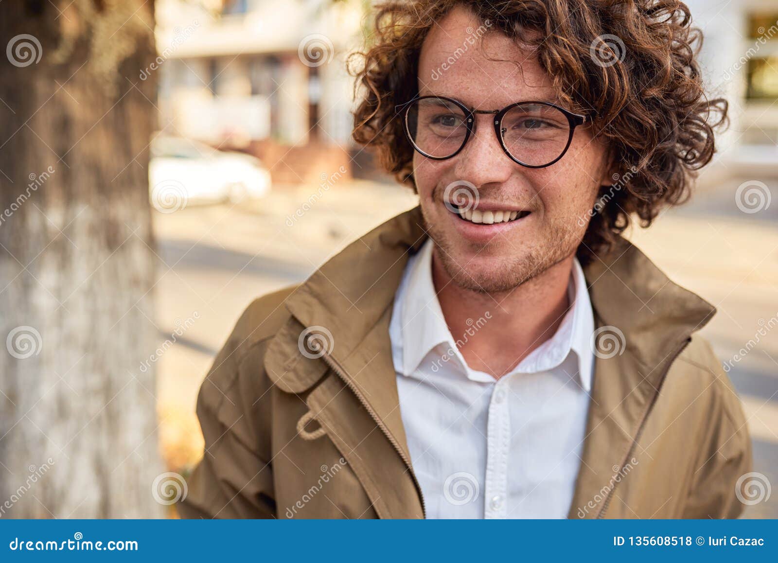 Closeup Portrait of Young Businessman with Glasses Smiling and Posing ...