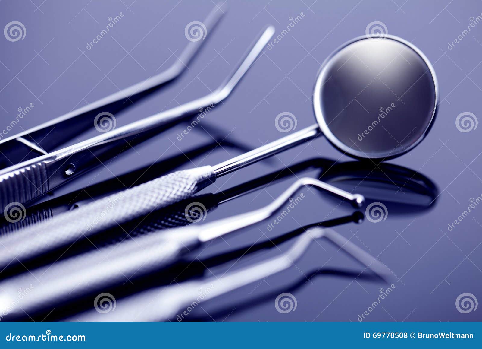 Closeup of Professional Dental Tools on Shiny Table Stock Photo Image