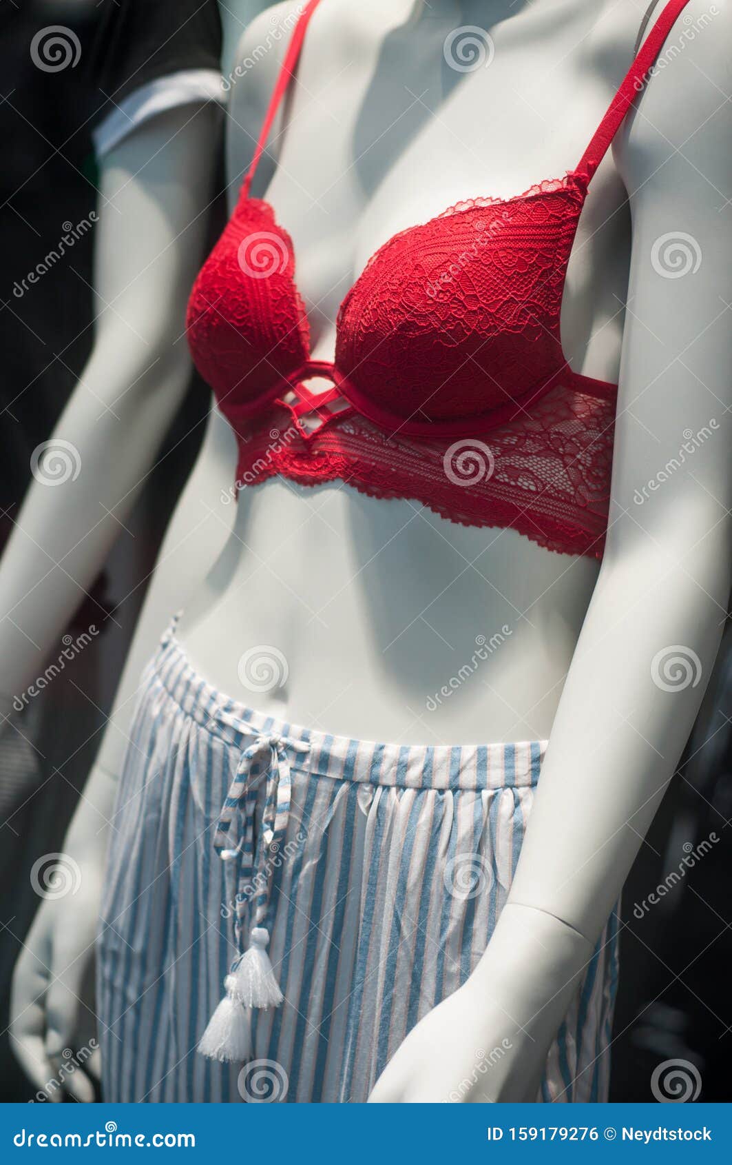 Red Bra and Pajamas on Mannequin in Fashion Store Showroom for