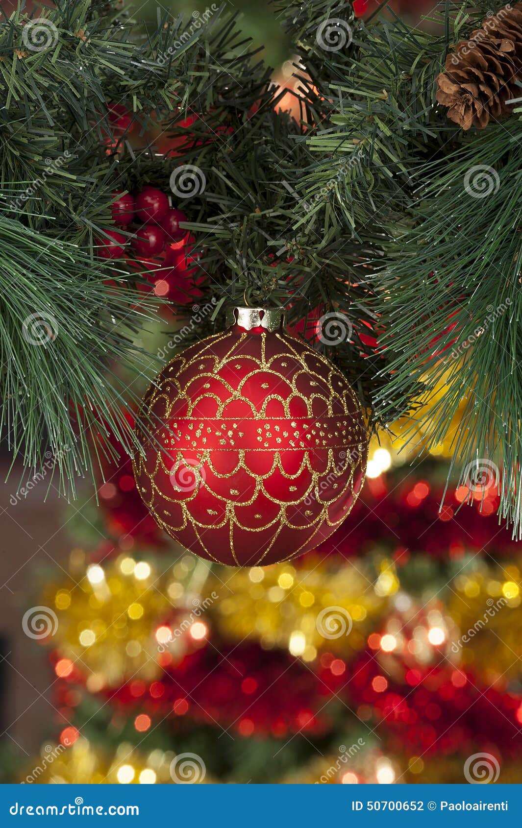 Closeup Of Red Christmas Balls On Colored Background Stock Photo