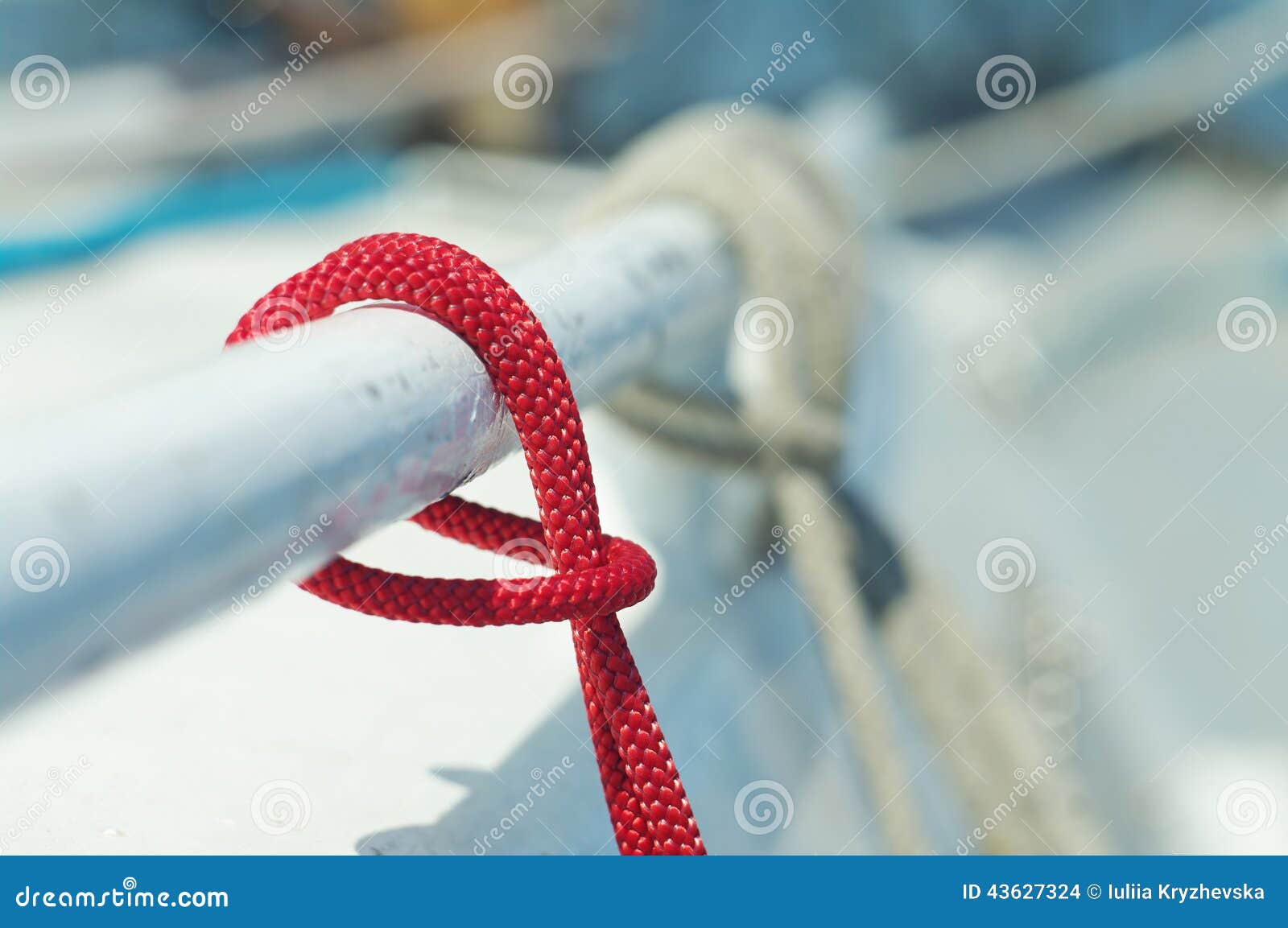 closeup of red thin short line used for yachting purposes