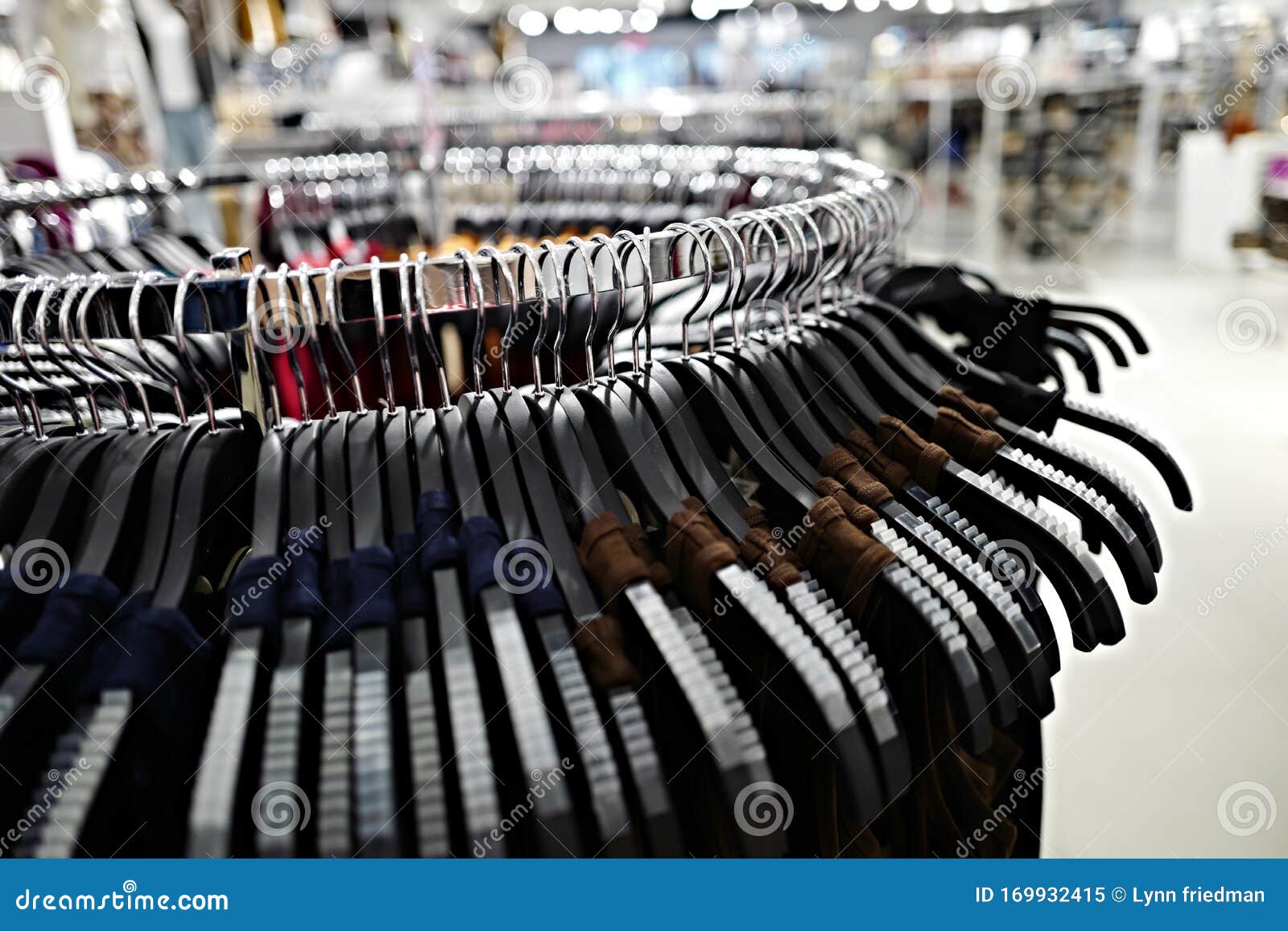 Closeup Round Rack of Clothing on Hangers in Retail Setting Stock Image ...