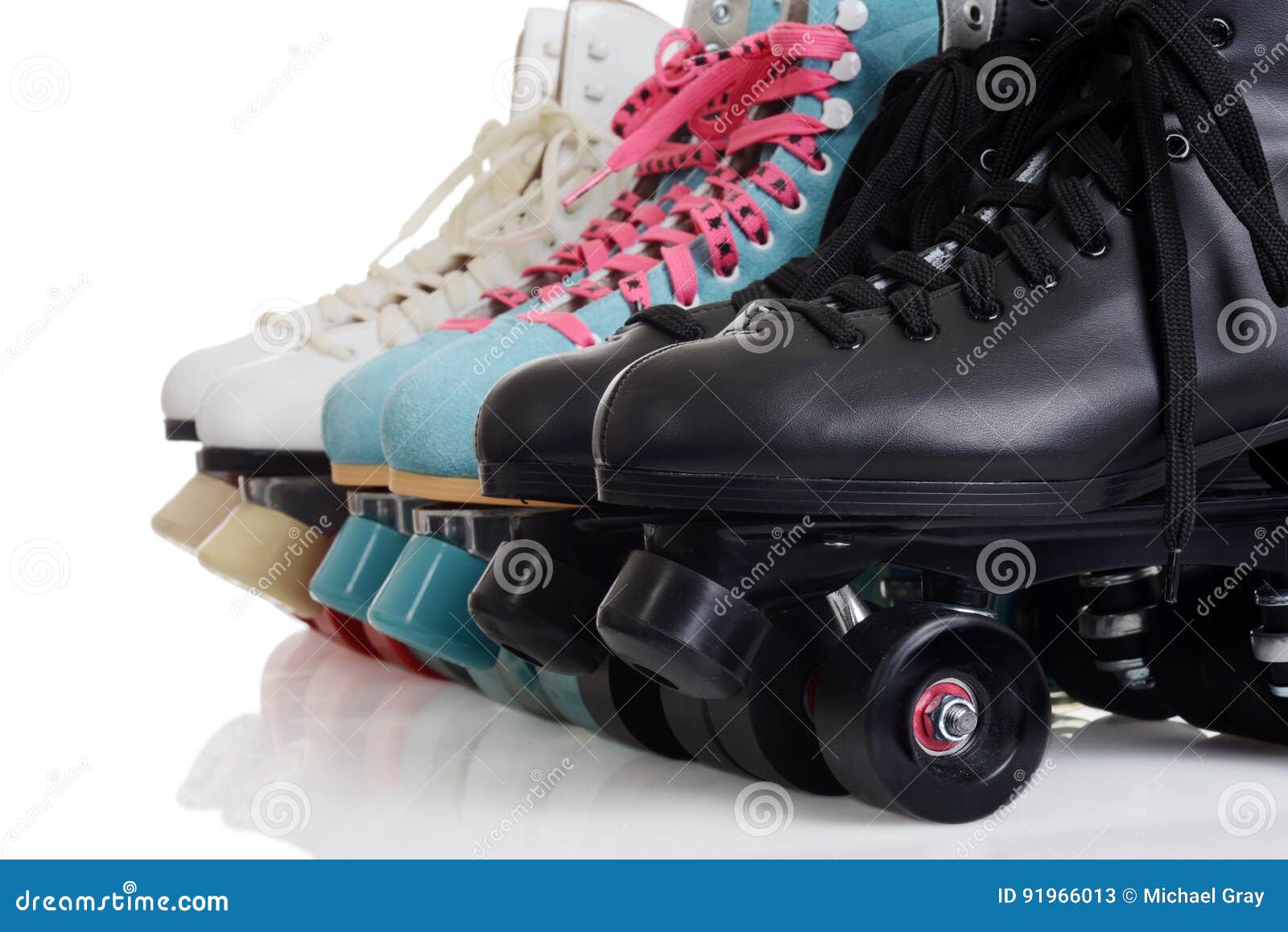 closeup row of quad roller skates