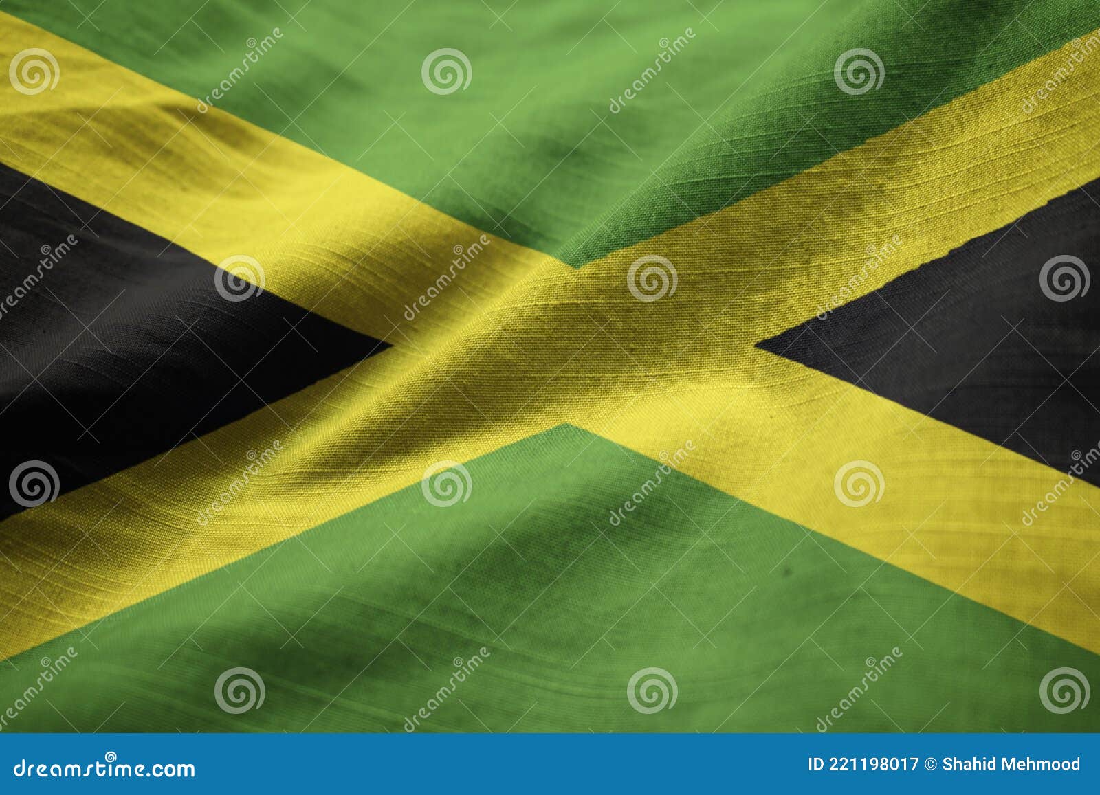 Closeup of Ruffled Jamaica Flag, Jamaica Flag Blowing in Wind Stock