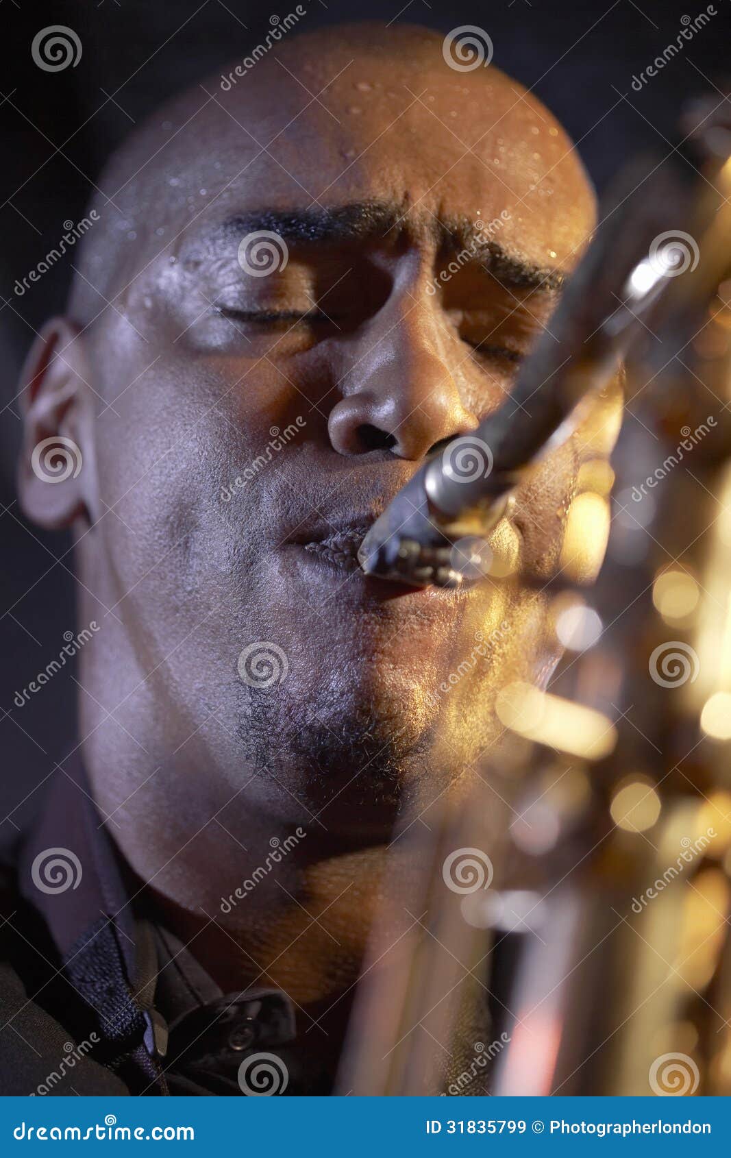 closeup of saxophone player