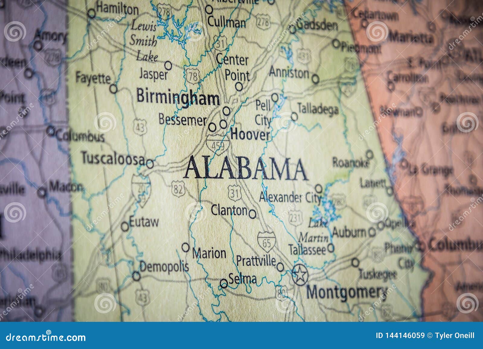 selective focus of alabama state on a geographical and political state map of the usa