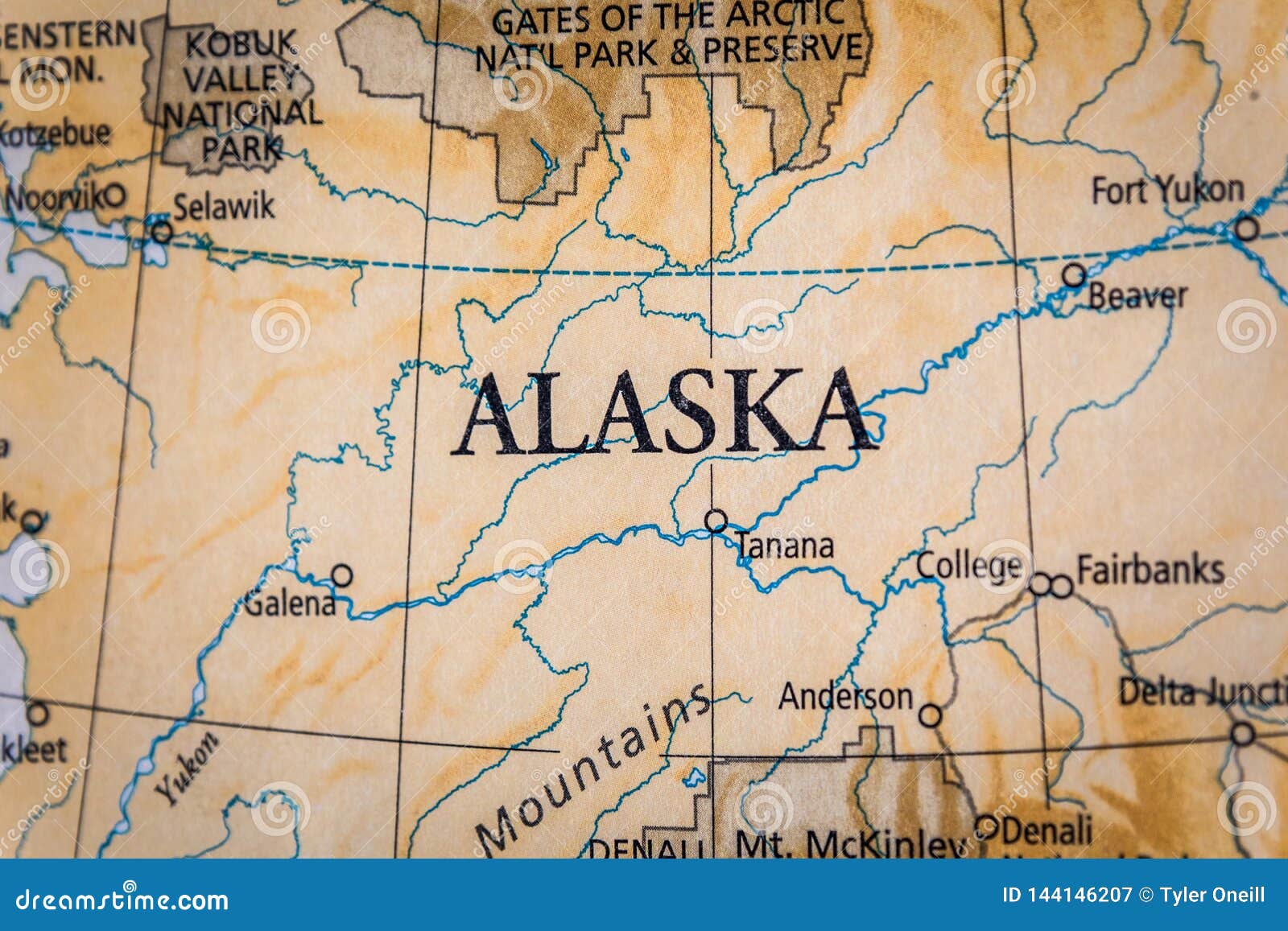 selective focus of alaska on a geographical and political state map of the usa