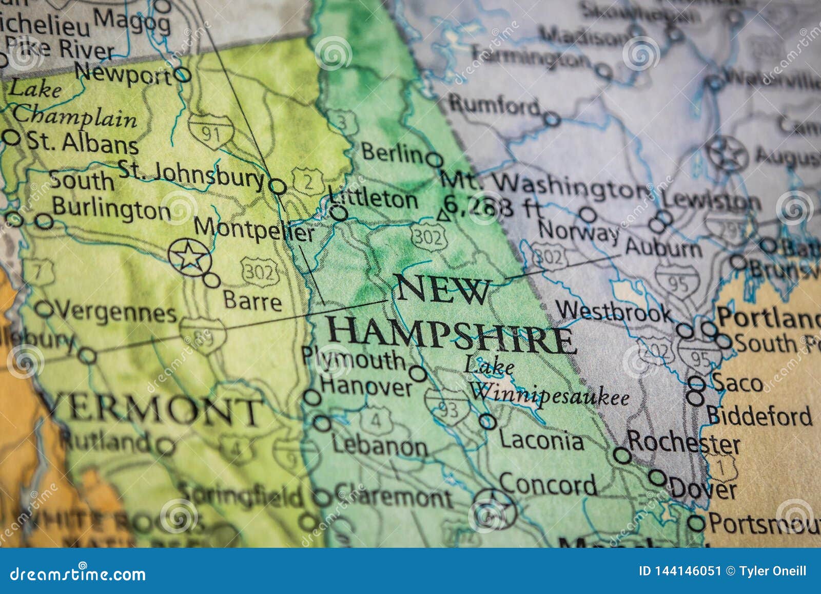 selective focus of new hampshire state on a geographical and political state map of the usa