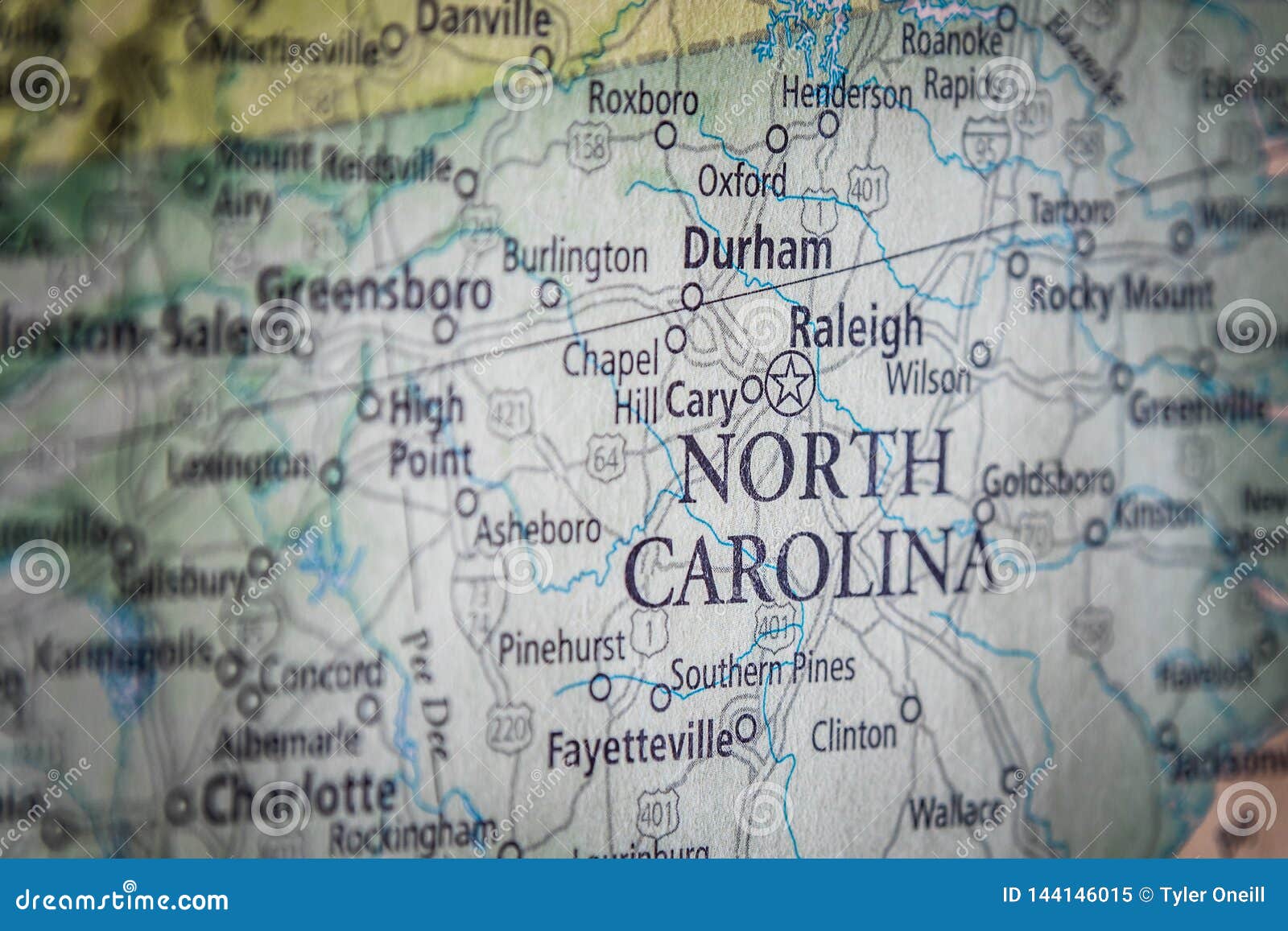 selective focus of north carolina state on a geographical and political state map of the usa