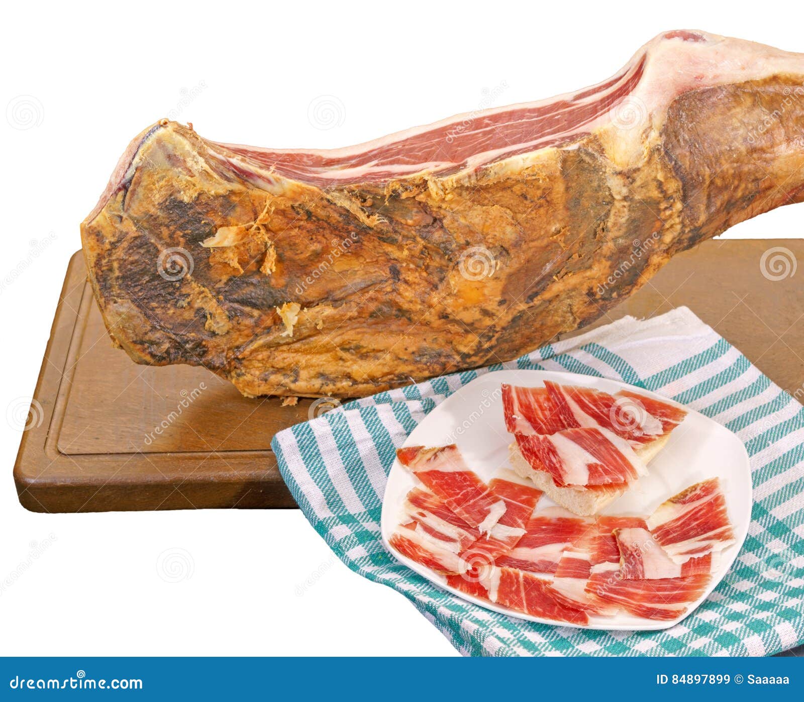 Closeup of Serrano Ham Leg with Plate and Tablecloth Stock Image