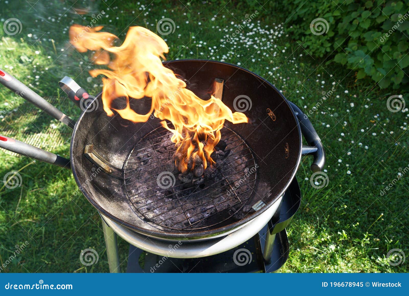 Closeup Shot of a Black Barbeque Grill Machine Outdoors Stock Image