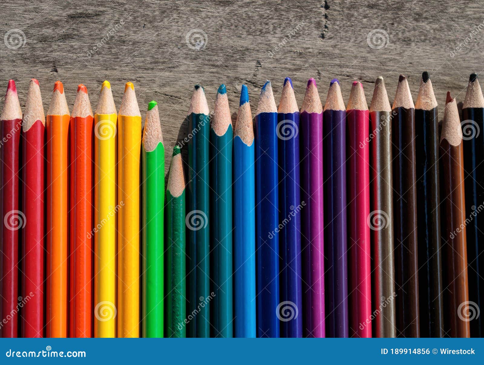 Closeup Shot of Colorful Pencils in a Shade Sequence from the Brightest
