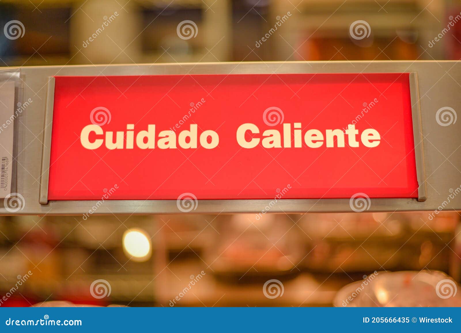 closeup shot of cuidado caliente text with a bokeh background