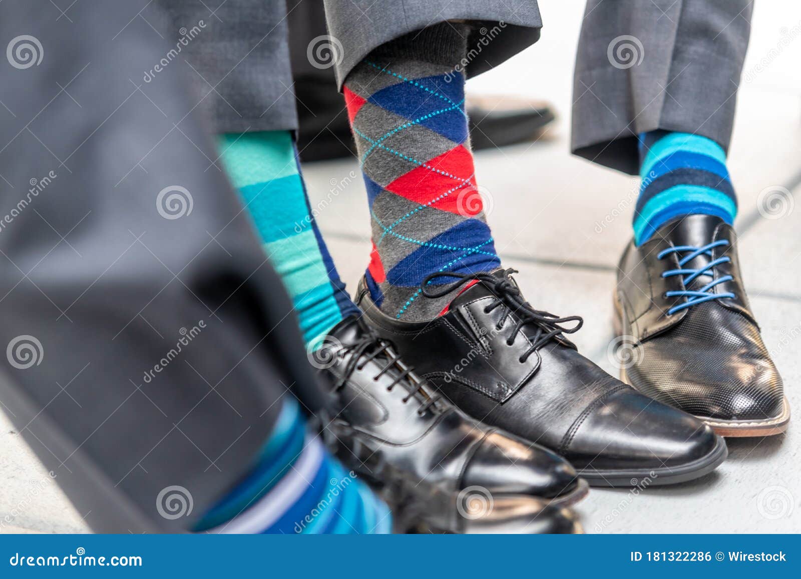 Closeup Shot of Men Wearing Patterned Colorful Socks with Suits and ...