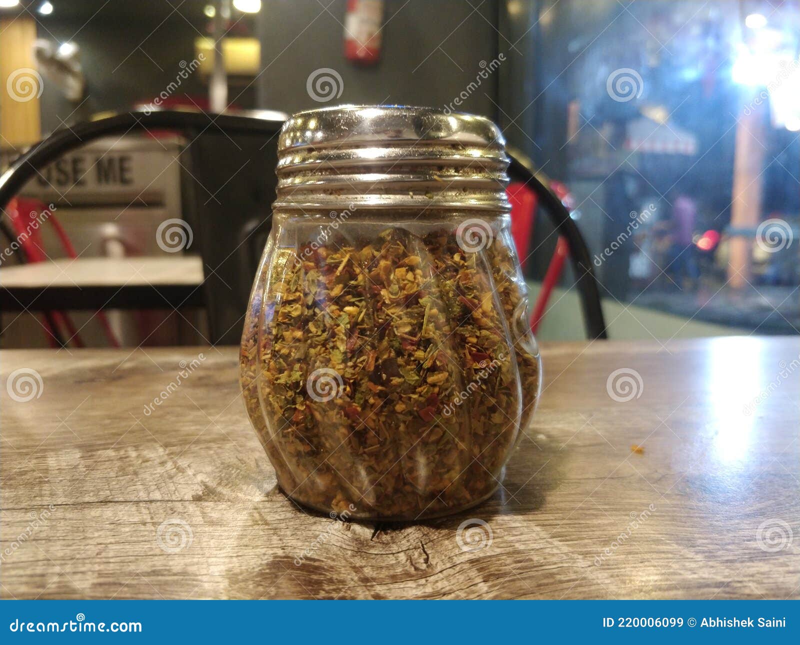 Closeup Shot of Oregano and Chilli Flakes on Table Stock Image Image