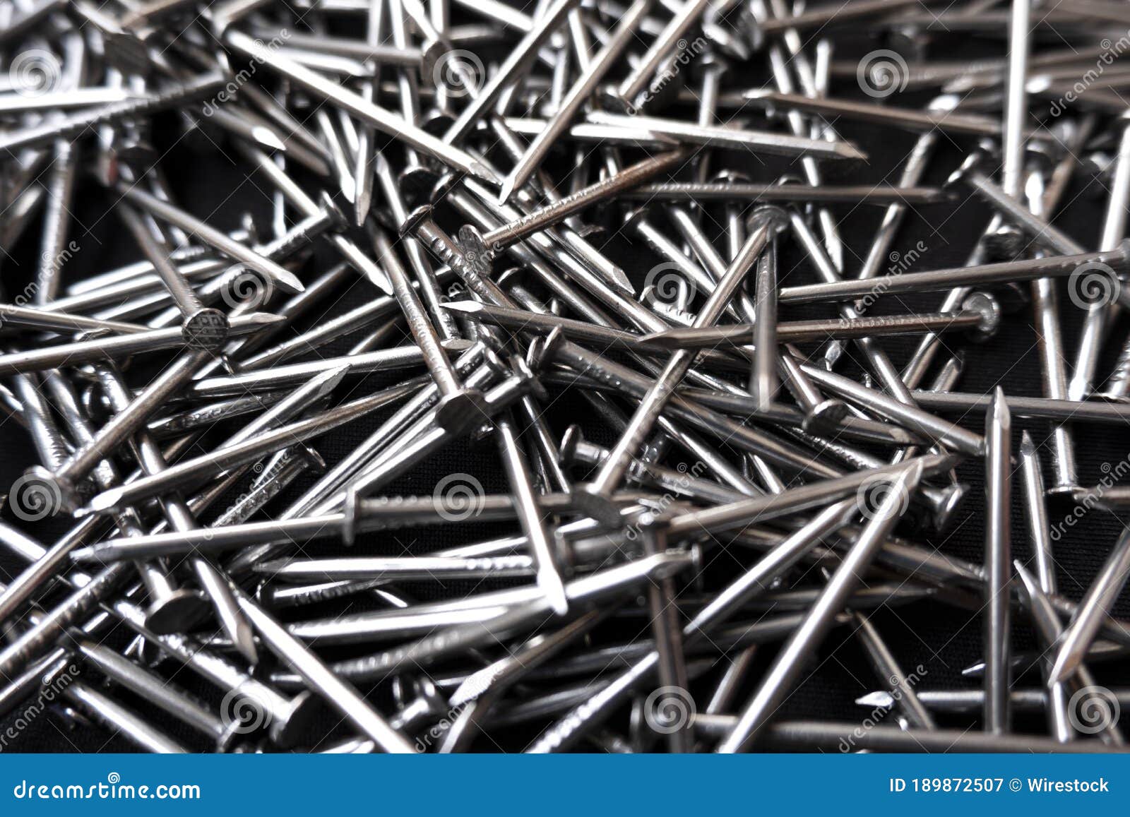 Closeup Shot of a Pile of Steel Nails on a Black Background Stock Image ...